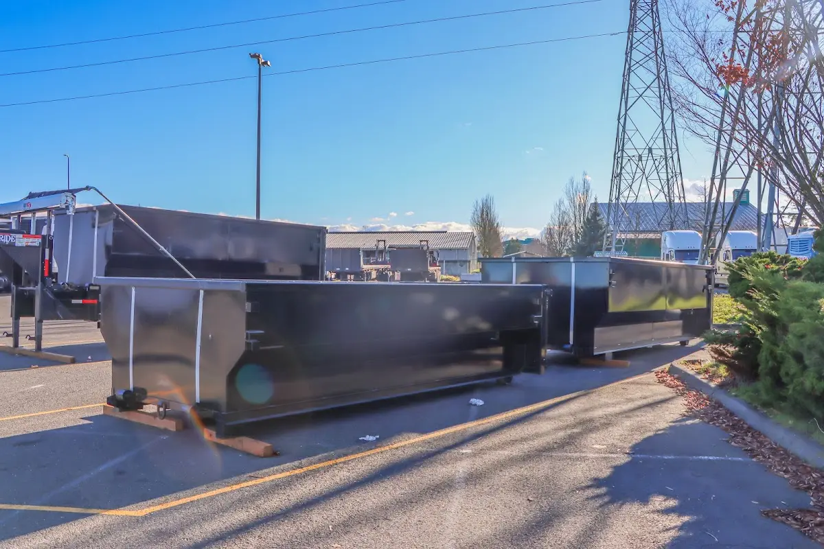 Roll-off dumpster ready for waste disposal at job site for Construction Dumpster Rental in Manorhaven